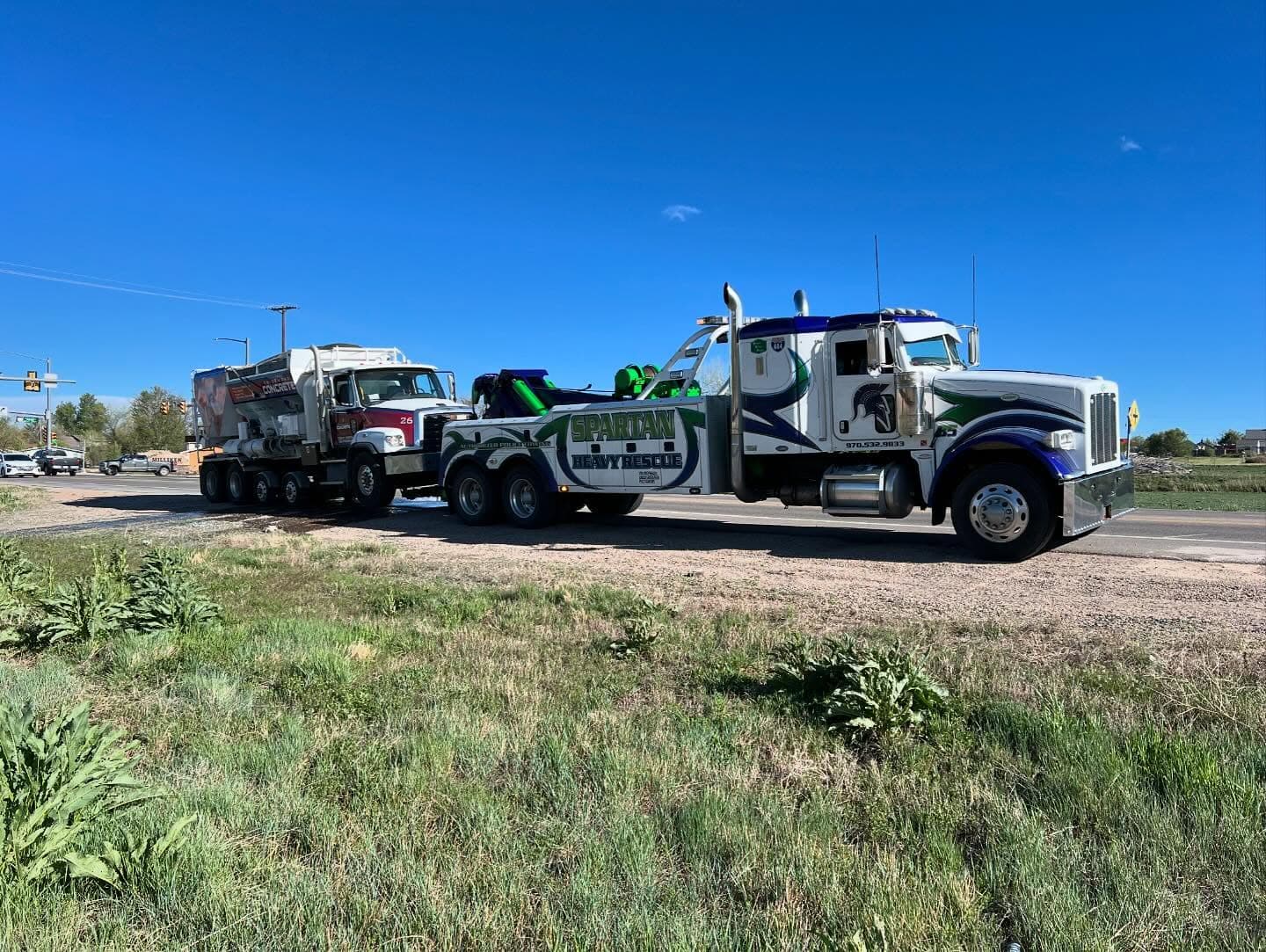 Three Spartan trucks lined up